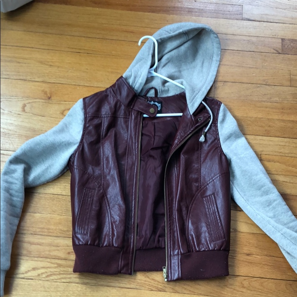 Burgundy and cream leather jacket.